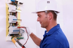 electrician measuring voltage