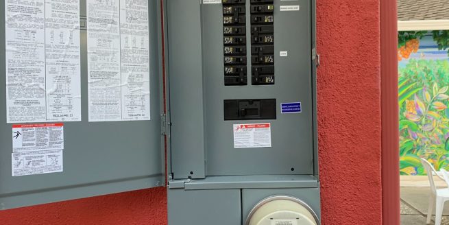 Licensed electrician performing 200A electrical panel upgrade in San Jose CA 95129 by Dollens Electric.