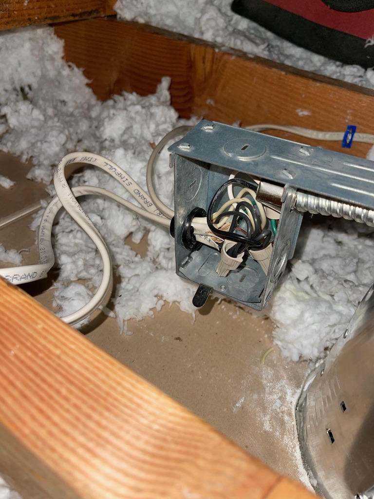 Electrical safety inspection of attic junction box in a San Jose home